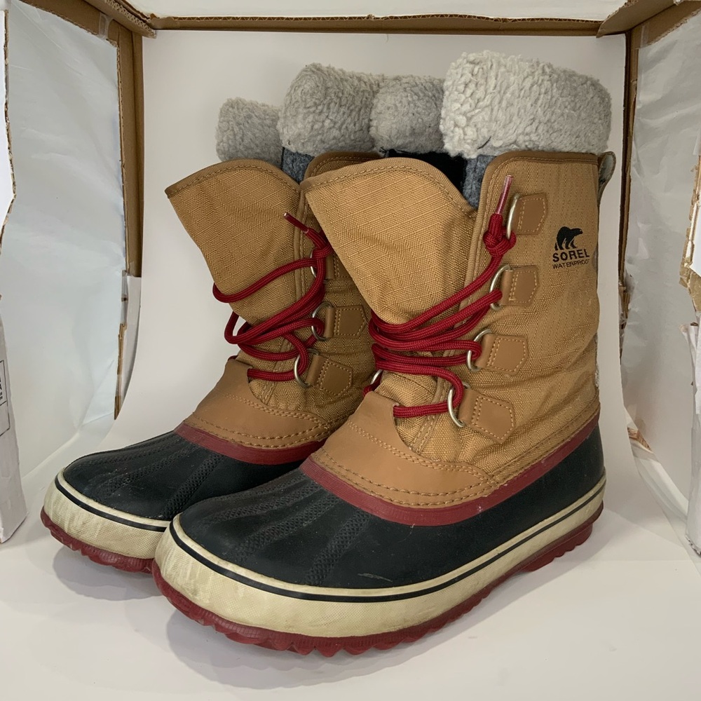 Sorel Tan and Black Winter Boots